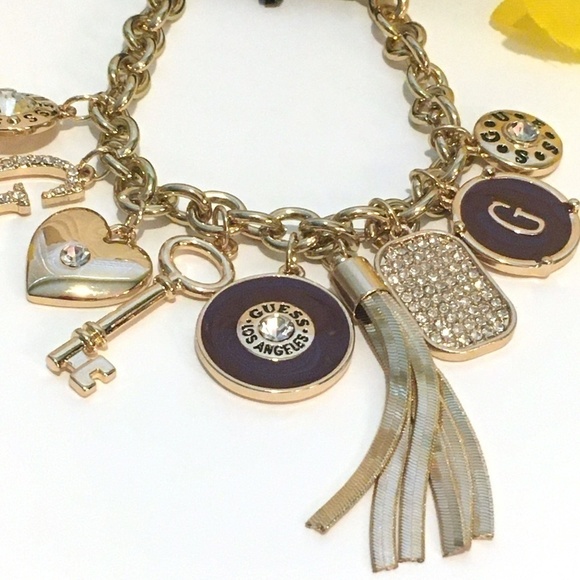 𝅺3/$29! GUESS Charm Bracelet Heart, Key, Tassel - Picture 5 of 9